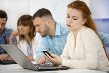 Student distracted by cell phone