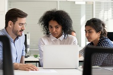 Racially diverse group working together